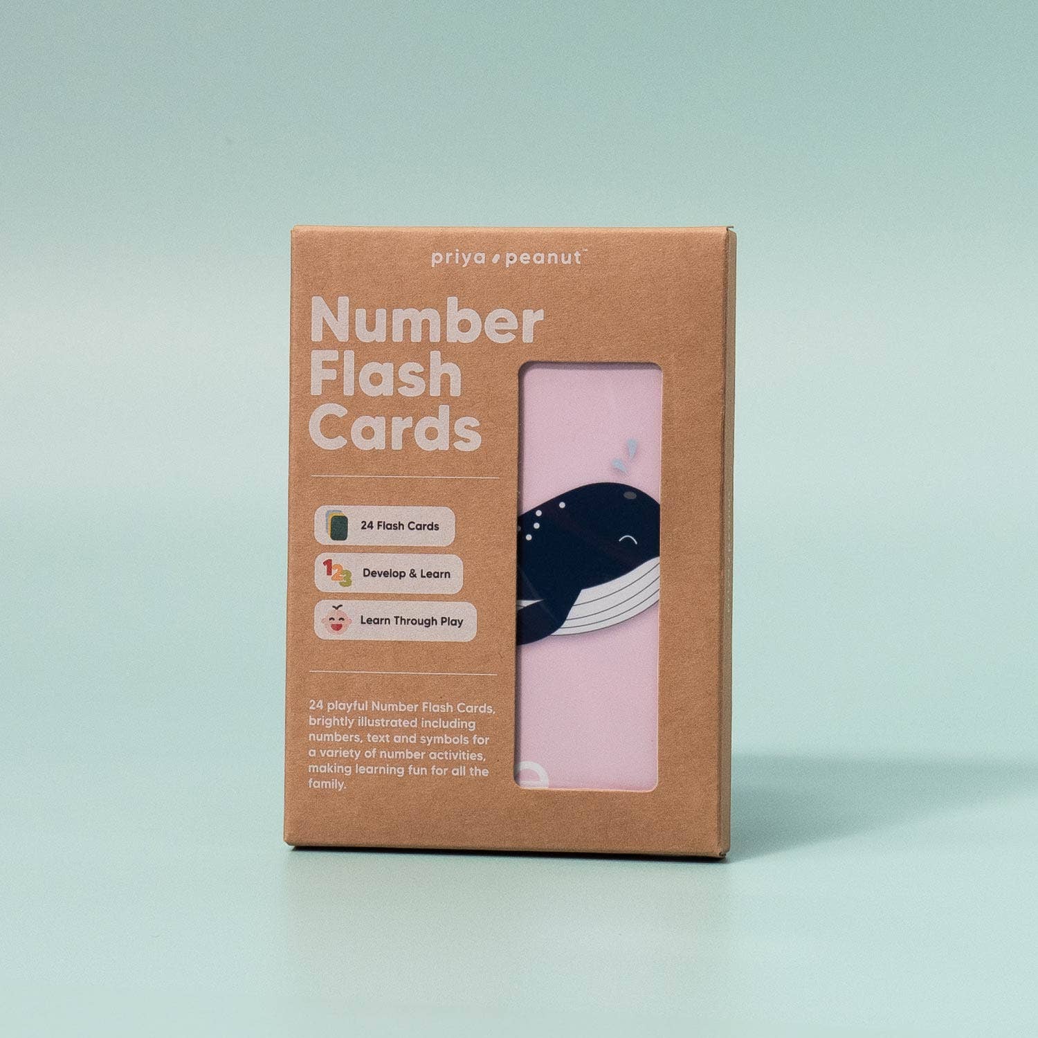 A box of Priya & Peanut Number Flashcards | Learn To Count 0-10 Easily stands upright against a pale green background, showing part of a card with a smiling whale through the front window—ideal for preschool learning.
