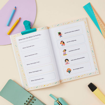 The My Mindful Me Journal Early Years Edition by Mindful Champs offers prompts like “When I feel sad I can...” with illustrated ideas—such as going outdoors or requesting a hug—encouraging mindful reflection and creative expression in children.