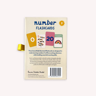 The back of the Lauren Sissons Studio Illustrated Number Flashcards box for ages 3+ shows 0, 5, and 20 cards, a yellow ribbon pull tab, and explains learning numbers 1-20 with fun counting flashcards for kids.