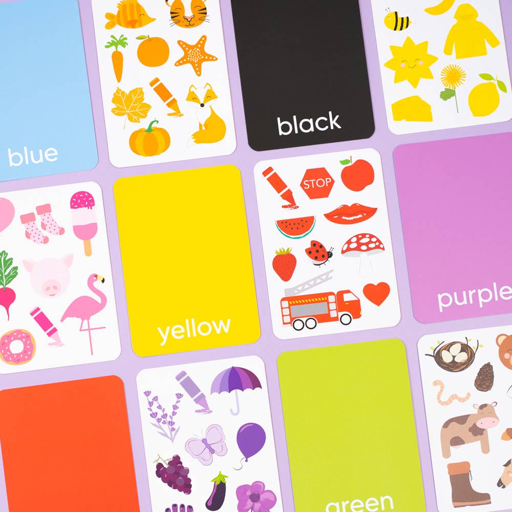 Priya & Peanut Colour Flash Cards are vibrant toddler learning cards labeled with color words and matching objects, including blue, orange, black, yellow, red, purple, and green—perfect for fun early education.