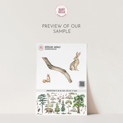 The Woodland Animals Nursery Stickers by My Store feature charming watercolor woodland decals, including a branch, rabbit, and various forest animals and trees. The Baby Belle logo is at the top with a note saying Preview of Our Sample above these delightful removable decals.