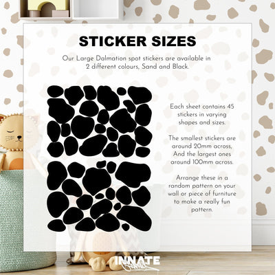 A nursery features a stuffed animal, basket, and a poster displaying My Stores Dalmatian Spot Large Stickers. Self-adhesive decals in various sizes offer size details and playful arrangement ideas for fun patterns.
