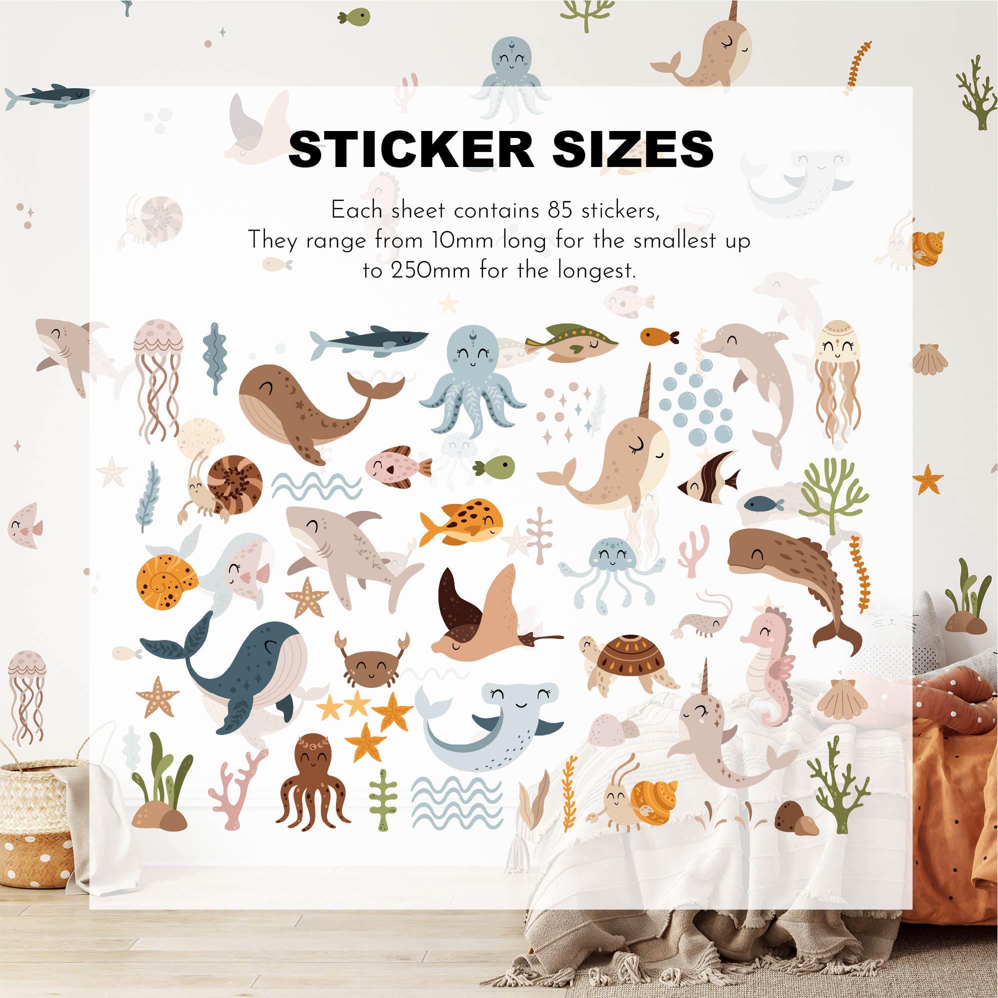 An inviting wall showcases My Stores Ocean Animals Stickers, featuring 85 vibrant whale, octopus, jellyfish, and seahorse decals per sheet. Ranging from 10mm to 250mm and removable, the stickers adorn above a cozy bed ready for relaxation.