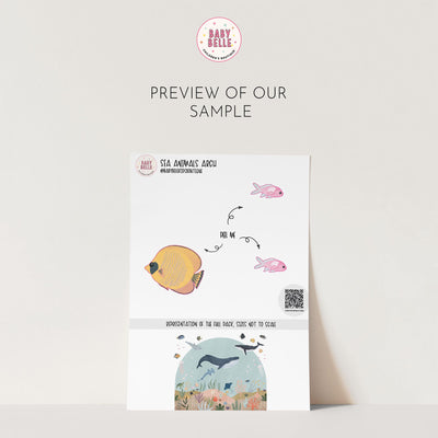 Celebrate a baby shower with an enchanting invitation card, featuring charming sea animals. The top showcases colorful fish alongside a QR code, while the bottom reveals a whimsical scene reminiscent of My Stores Sea Animals Arch Wall Sticker, with a whale and fish swimming amid coral.