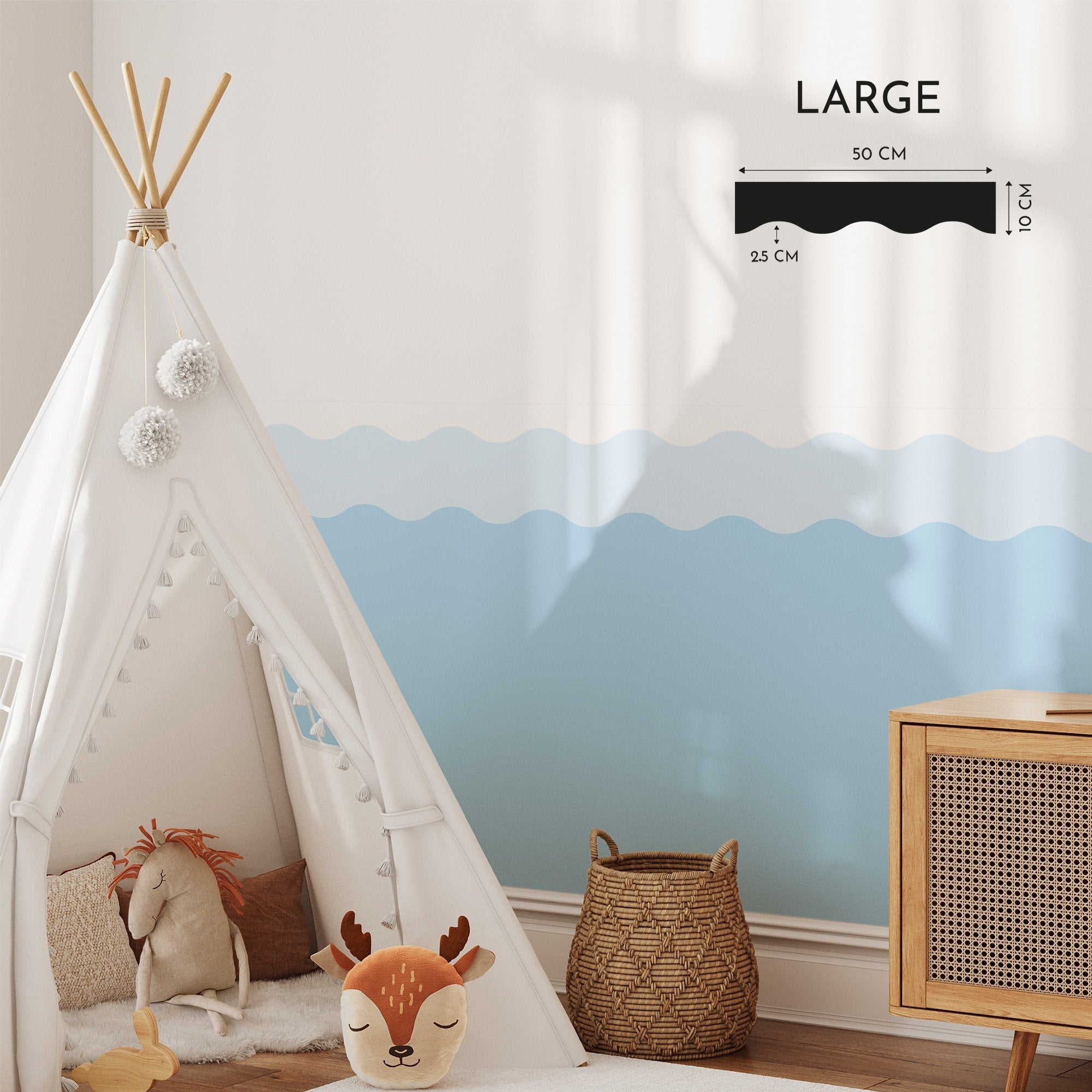 A cozy childrens room includes a white teepee with soft animal toys inside and a blue Wave Wall Stencil by My Store that adds charm. A wicker basket and wooden cabinet complete the sunny, inviting space.